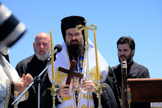 Bishop Evmenios of Kerasounta presiding over the Theofania service at Princes Pier.