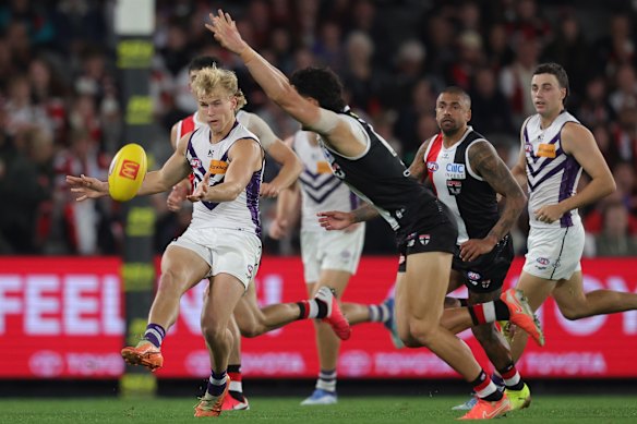 Karl Worner of the Dockers is smothered by St Kilda’s Mitch Owens.