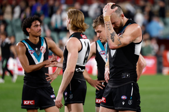 Charlie Dixon of the Power looks dejected after their loss against Geelong.