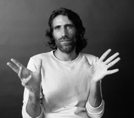 The artist's photo portrait of Behrouz Boochani.  
