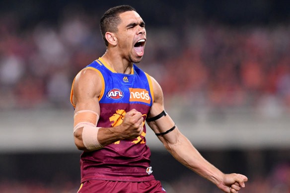 Lion Charlie Cameron celebrates a goal.