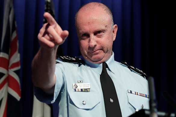 Acting Australian Federal Police commissioner Neil Gaughan addresses the media over the raids.