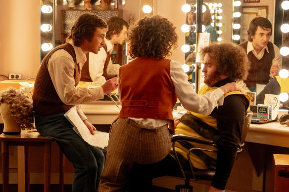 Gabriel LaBelle (left) as Lorne Michaels, Rachel Sennott as Rosie Shuster and Matt Wood as John Belushi in Saturday Night.