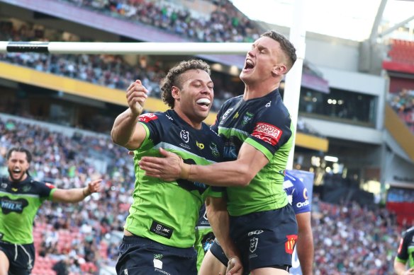 Canberra players celebrate after beating the Bulldogs at last year’s Magic Round in Brisbane.