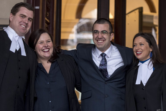 Faruk Orman (in glasses) on the steps of the Supreme Court with his lawyers on Friday. 