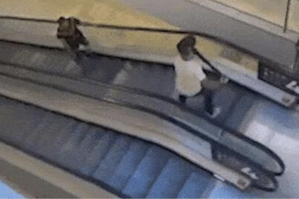 “Bollard man” Damien Guerot on a Bondi Junction Westfield escalator facing off with the attacker.