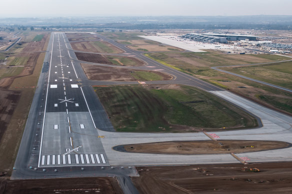 Giant Xs on the runway signal to planes that they cannot land at Western Sydney Airport. They will be temporarily removed for the first flights on Wednesday.