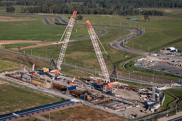 Cranes working on the terminal station for the airport metro line.