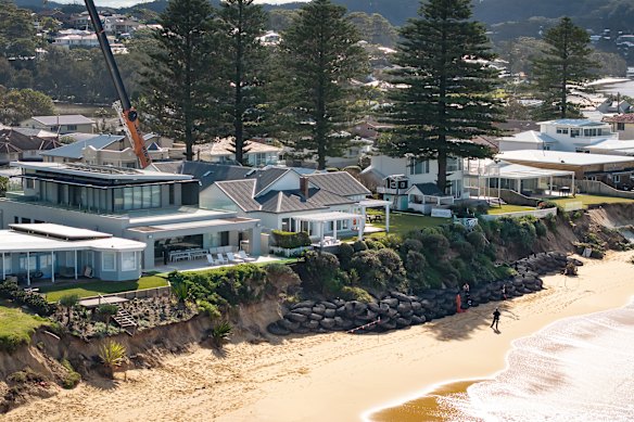 Beachfront homes in Wamberal are in danger of falling into the sea.