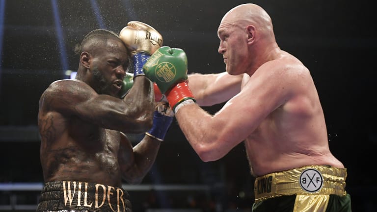 Deontay Wilder (left) fights Tyson Fury in their draw earlier this month.