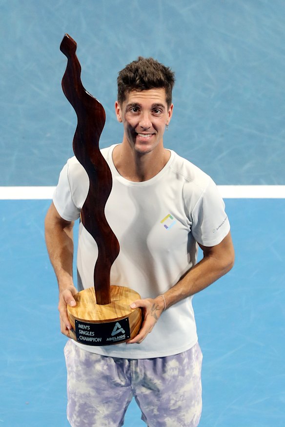 Thanasi Kokkinakis with his 2022 Adelaide trophy.