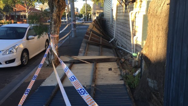 A fence knocked down by wind in Graham Street, Port Melbourne.