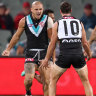 As it happened: Fast-finishing Power overrun Dogs in the wet, unfancied Bombers stun Dees in huge uspet, Lions demolish North