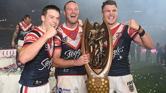 Luke Keary, Boyd Cordner and Angus Crichton of the Roosters celebrate their NRL win.