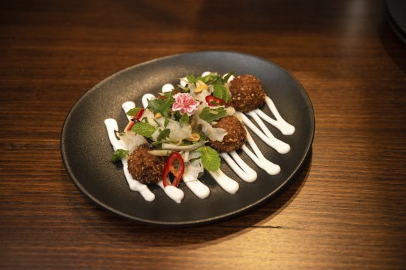 Crisp rice ball salad aka “red curry arancini”.