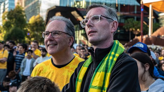 Alister Henskens, left, and Premier Dominic Perrottet watched the Socceroos at the Sydney live site last weekend.
