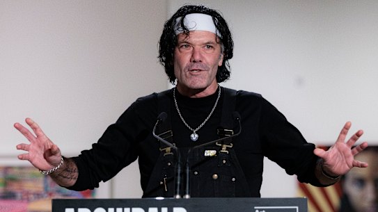 Blak Douglas accepting the Archibald Prize for his portrait of Karla Dickens. 