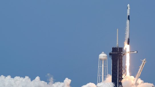 A SpaceX Falcon 9, with NASA astronauts Doug Hurley and Bob Behnken in the Crew Dragon capsule, lifts off from Pad 39-A at the Kennedy Space Centre in Cape Canaveral.