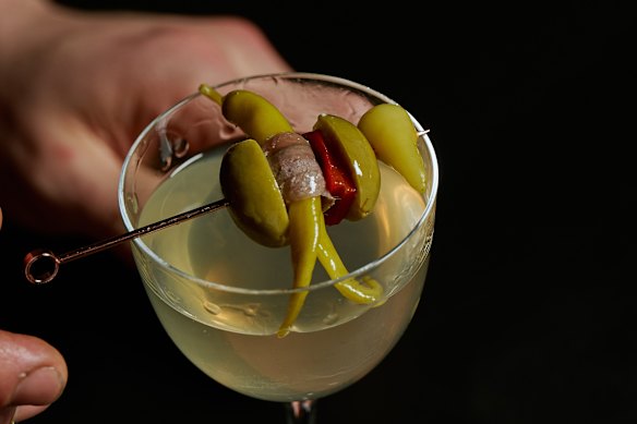 The house martini garnished with a gilda.