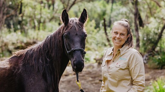 Sydneysider Cassandra Steppacher with her newly adopted brumby.