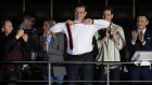 Ekrem Imamoglu, Istanbul mayor and the Republican People’s Party (CHP) candidate, takes off his tie from atop a campaign bus while claiming victory.