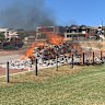 A garbage truck was forced to empty its load in a parking lot in East Fremantle after the contents caught fire yesterday.