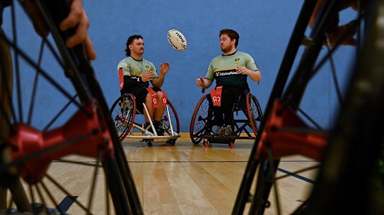 Australian wheelchair rugby league captain Bayley McKenna (left) with teammate Liam Luff. 