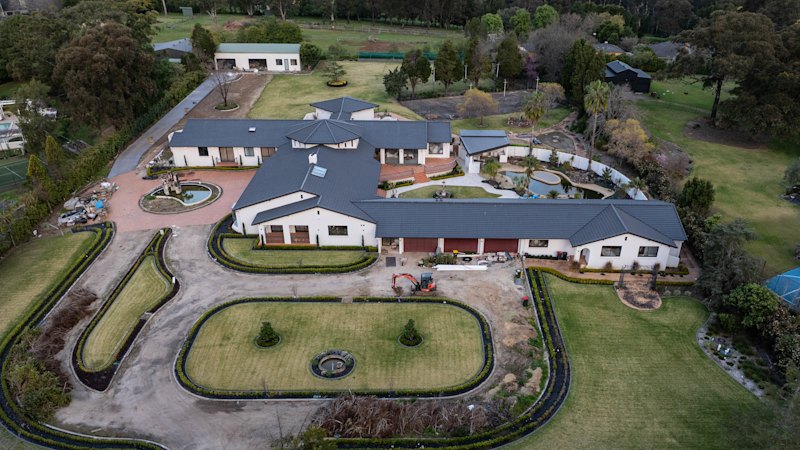 As debt mounts for collapsed company, work continues on Bathla’s $5.5m family mansion