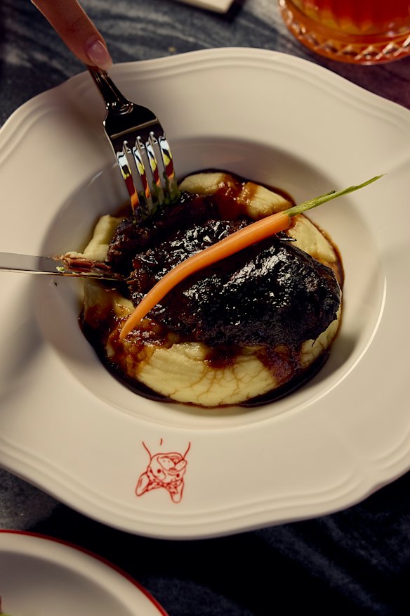 Beef cheek with Parisian mash and bourguignonne sauce.