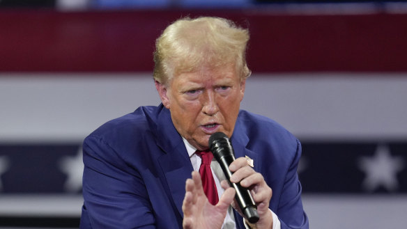 Donald Trump speaks during a town hall event at the Dort Financial Centre in Flint, Michigan.