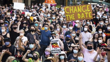 Protestors gather at Town Hall for the Invasion Day March in Sydney on Wednesday, January 26, 2022. 