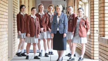 Principal Gaynor Robson-Garth with year 12 students at Camberwell's Siena College.