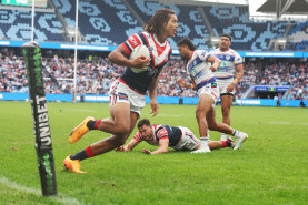 Dom Young scores for the Roosters on Sunday.