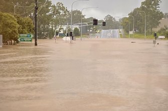 The Boundary and Blunder roads intersection at Oxley in Brisbane was under deep water on Saturday.