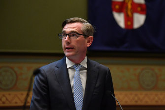 NSW Treasurer Dominic Perrottet delivers the NSW budget to Parliament House in Sydney on Tuesday.