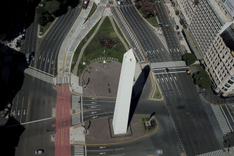 The Avenue "9 de Julio" is empty around the Obelisk monument in Buenos Aires, Argentina, following the government's lockdown orders. 