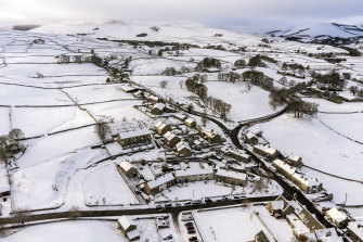 Hawes in North Yorkshire is covered by snow on Sunday. 