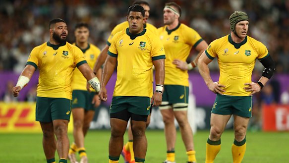 Sad exit: David Pocock, far right, reacts to defeat with Wallabies teammates.
