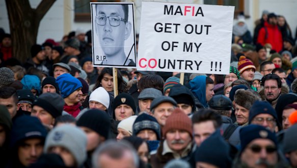 Protesters in Bratislava march in memory of murdered journalist Jan Kuciak in 2018.