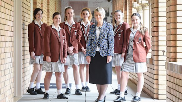 Principal Gaynor Robson-Garth with year 12 students at Camberwell's Siena College.