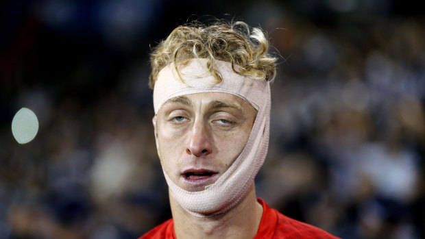 Saving face:  Lawrence Thomas after his match-winning performance for Melbourne Victory.