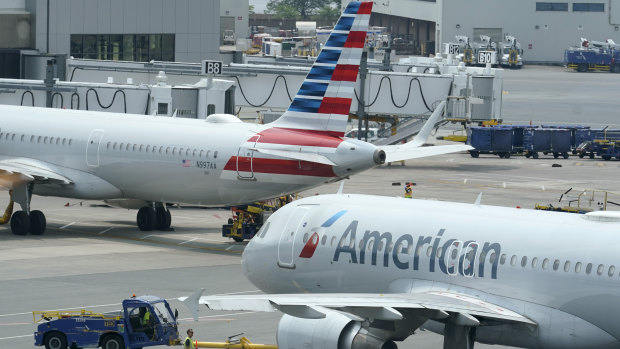 American Airlines passenger jets prepare for departure in Boston.