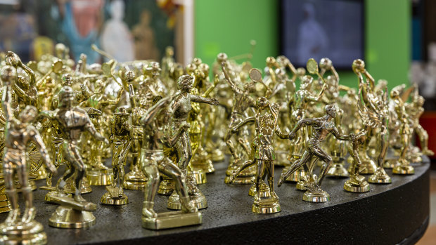 Removed from their plinths, the golden trophy figurines in The Field take on a strange quality.