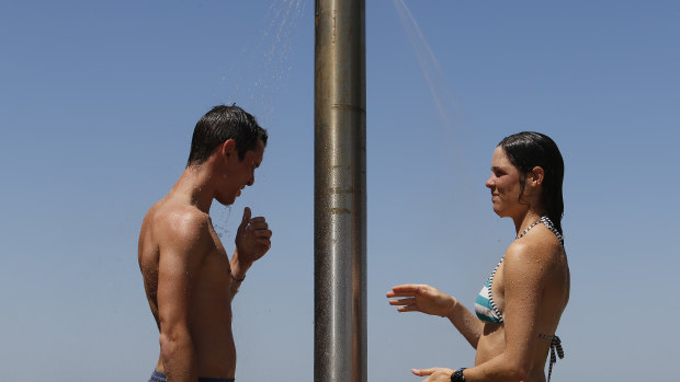 Cooling off at St Kilda beach on Friday.