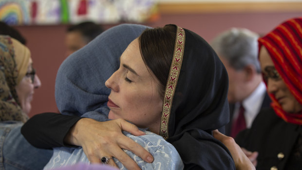 Jacinda Ardern comforts a member of Christchurch's Muslim community. 