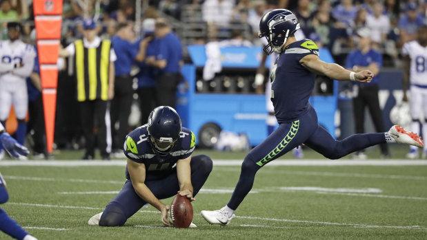 Making his mark: Michael Dickson holds the ball for Seahawks field goal kicker Jason Myers during the pre-season.