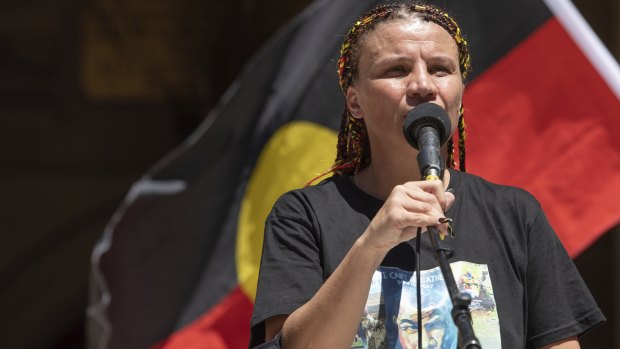 ‘Day of violence’: Activist Elizabeth Jarrett addresses the crowd at Town Hall.