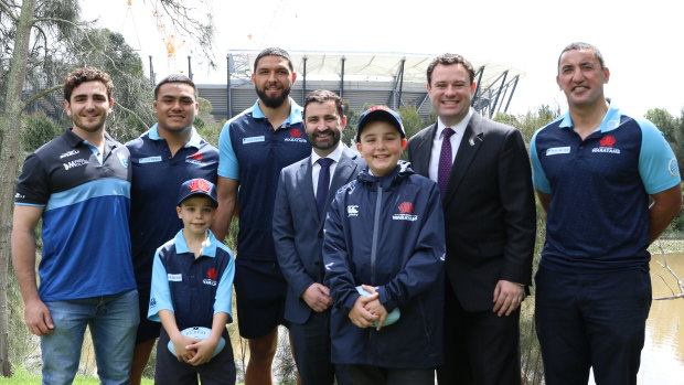 Go west, young men: Parramatta's Ken Catchpole Medalist Adrian Musico, Waratahs prop Shambeckler Vui, centre Curtis Rona, NSW Rugby Union boss Andrew Hore, NSW Minister for Sport Stuart Ayres and Waratahs coach Daryl Gibson with Waratahs supporters Lincoln, 11, and Hayden Milson, 8.