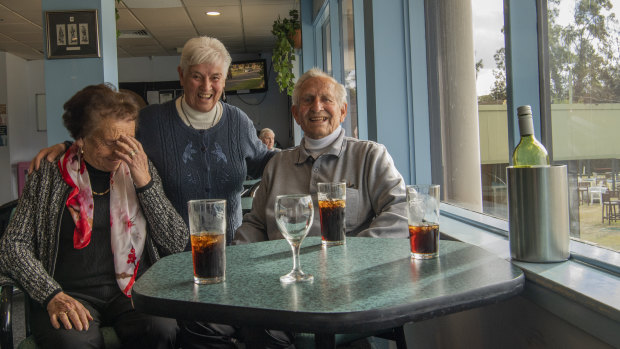 Lorraine Costelow (left), her husband Len and friend Anne have a final drink at the "friendly" club. 