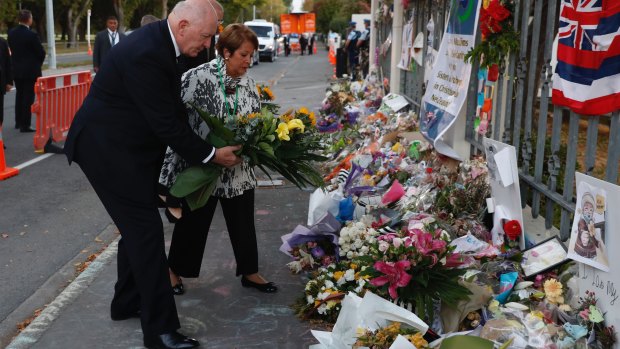 Australian Governor-General Sir Peter Cosgrove and his wife Lynne pay tribute outside the Al-Noor Mosque in Christchurch, New Zealand.